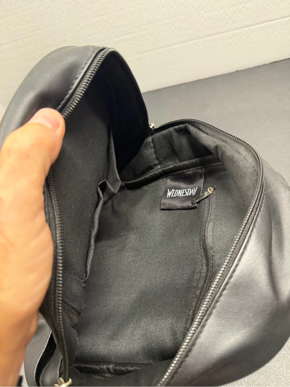 Mini Black Crest Backpack with Front Buckle Pocket